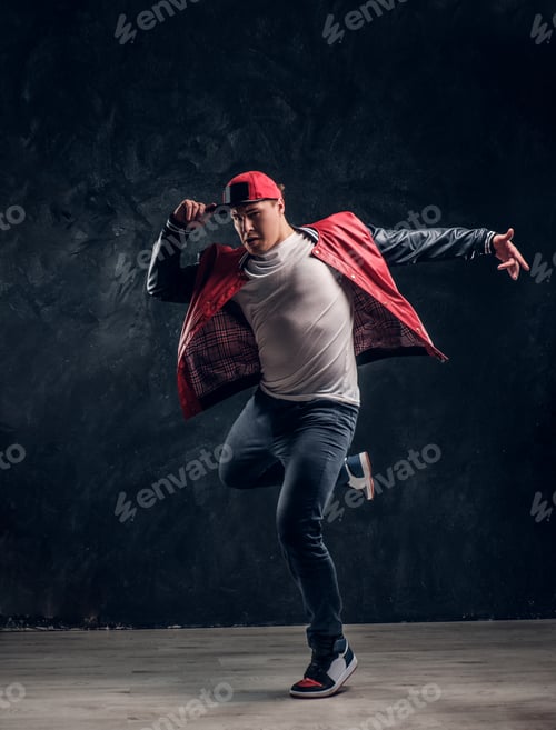 Preview: Stylish guy performs breakdance acrobatic elements.