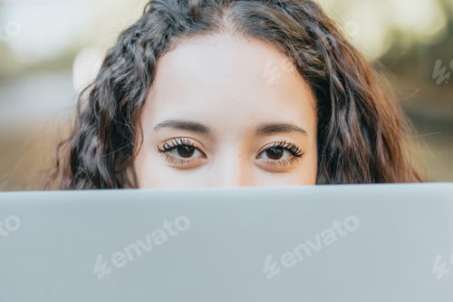 Preview: Close up portrait Young african college using laptop, girl having video call on laptop