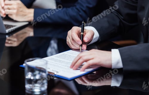 Preview: Businessman signing the papers