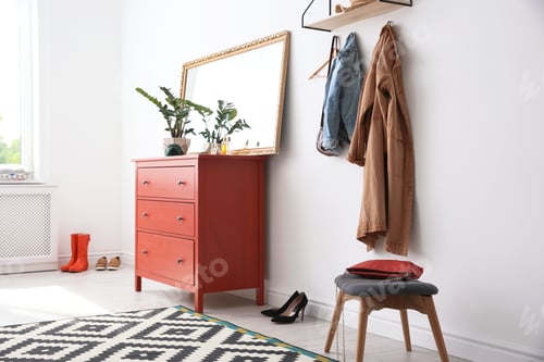 Preview: Stylish hallway interior with mirror and chest of drawers