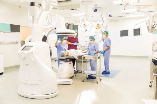 Preview: Doctors preparing a patient for surgery