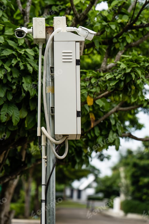 Preview: Vertical shot of cameras on the street on a blurred background