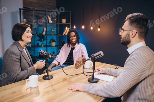 Preview: Content creators recording a new podcast episode discussing and sharing their ideas with microphones