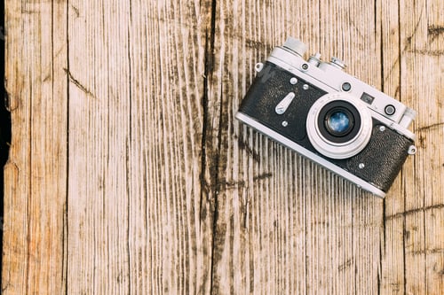 Preview: 35mm Vintage Old Retro Small-Format Rangefinder Camera On Old Wo