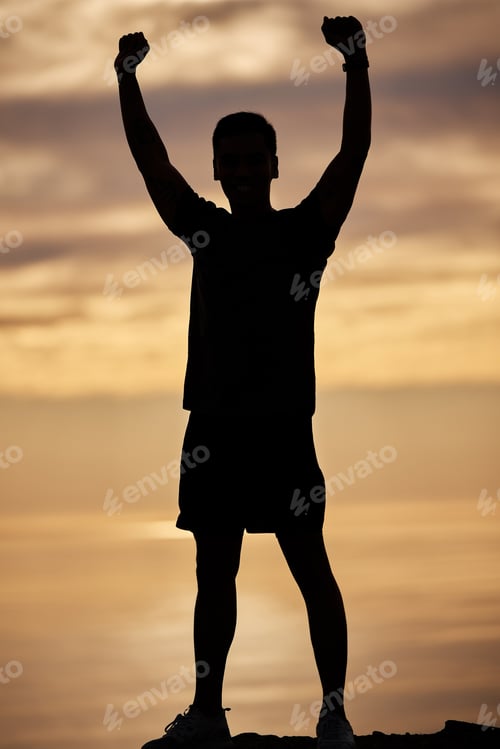Preview: Training to be triumphant. Shot of a young man exercising in nature.