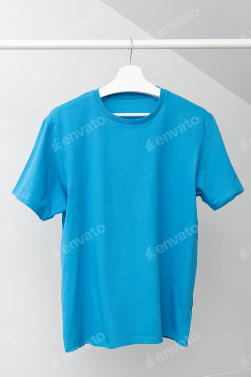 Preview: Blue T-shirt hanging on Clothing rack