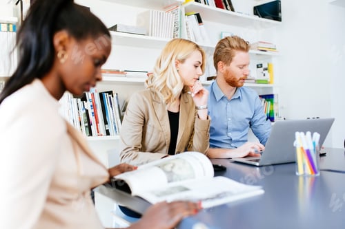 Preview: Businesspeople working in office