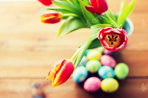 Preview: close up of easter eggs and flowers in bucket