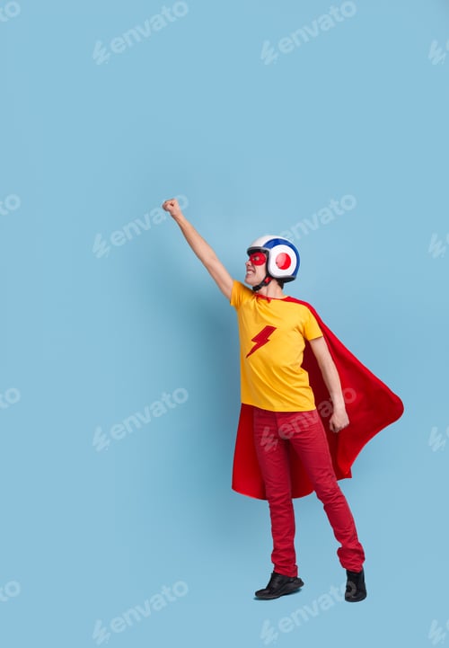Preview: Funny courageous superhero in hardhat in studio