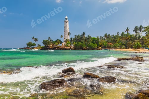 Preview: White lighthouse Dondra Head and tropical palms, Sri Lanka, near Matara.
