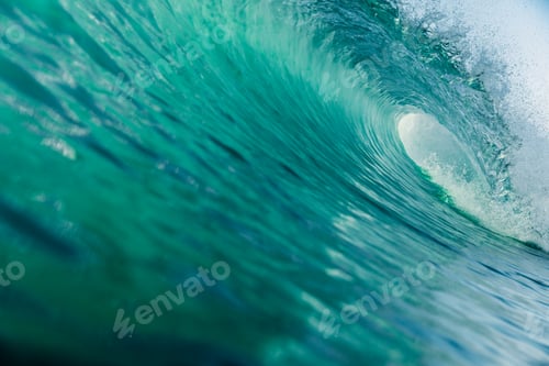 Preview: Inside ocean barrel wave with sun light and turquoise water texture
