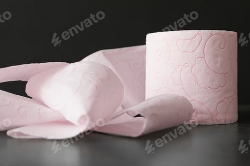 Preview: Soft toilet paper roll on black background