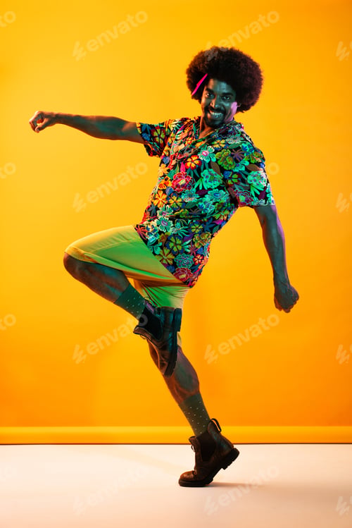 Preview: African man portrait in studio on colorful background