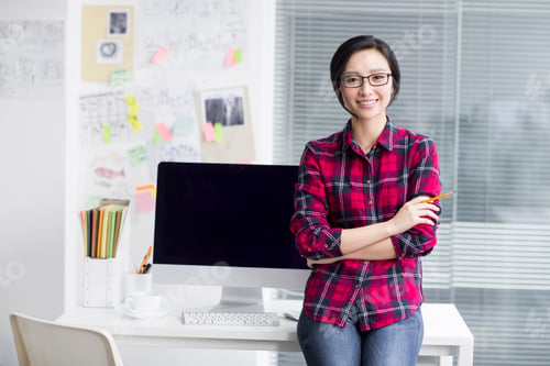 Preview: Portrait of young woman in office