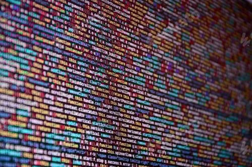 Preview: Software developer programming code on computer