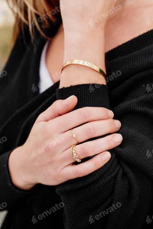 Preview: model posing with jewelry.