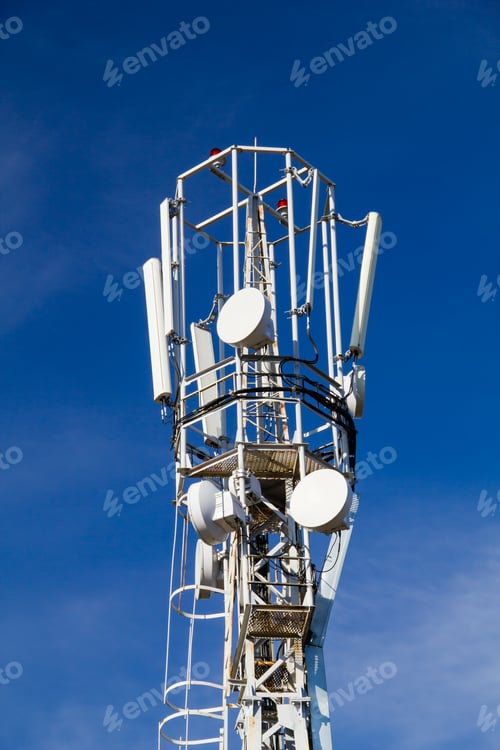 Preview: Cellular antennas on the top of the mast, close-up on a background of blue sky