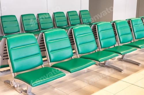 Preview: Rows of modern green chairs in waiting room