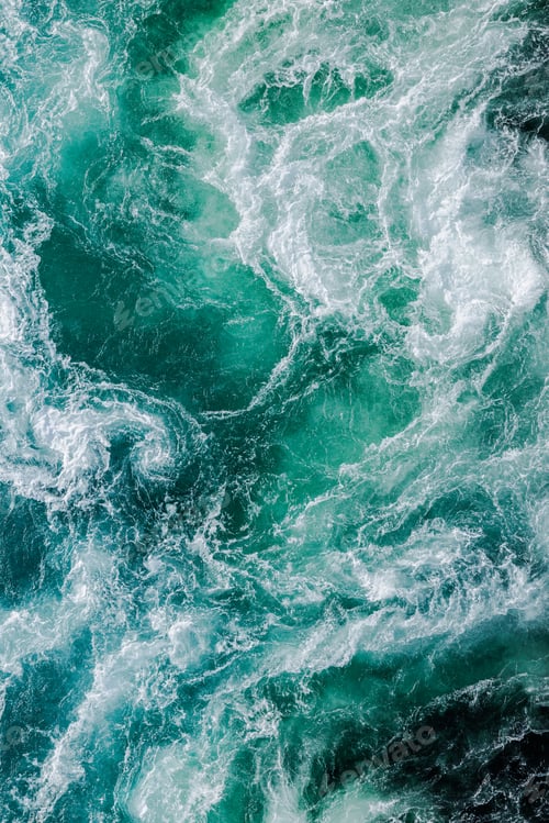 Preview: Blue waves of water of the river and the sea meet each other during high tide and low tide.