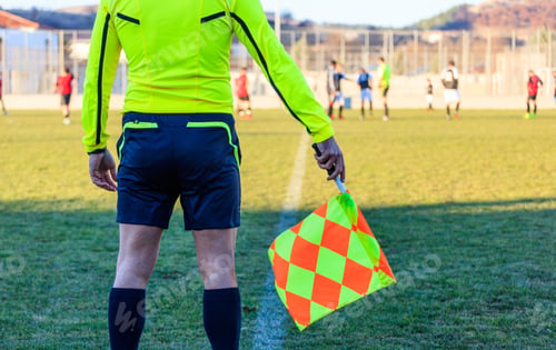 Preview: Football assistant referee in action