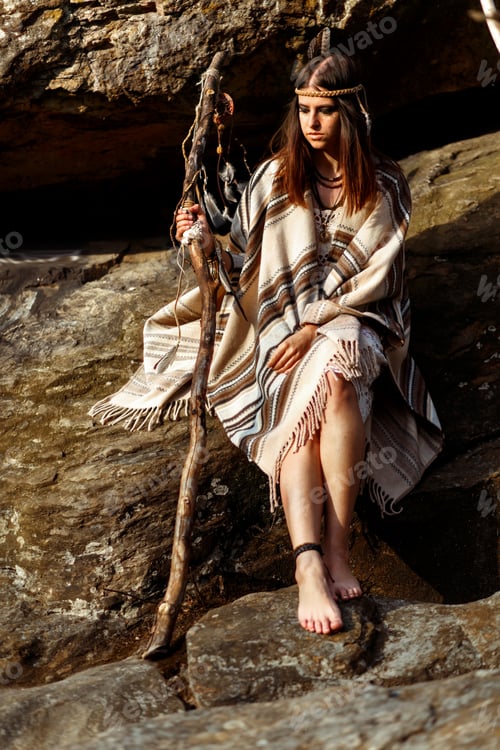 Preview: beautiful native indian american woman on background of woods and rocks
