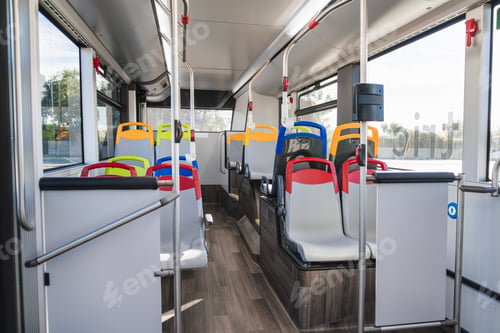 Preview: Empty city bus interior with colorful seats