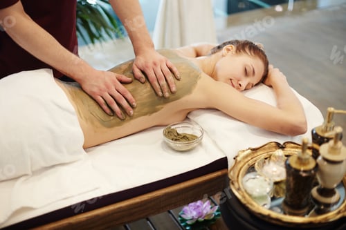 Preview: Woman Enjoying Mud Massage in SPA