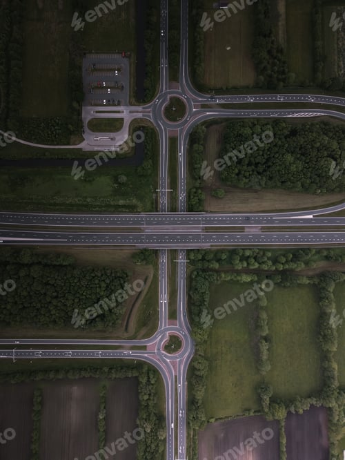 Preview: Drone shot of a highway showing the long stretch of road with cars driving on it