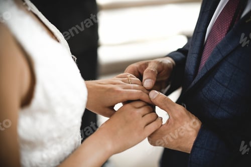 Preview: Bride and groom standing at the altar