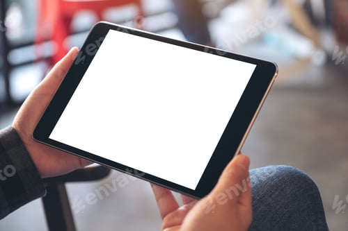 Preview: Mockup image of woman's hands holding black tablet pc with blank screen horizontally in cafe