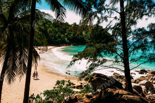 Preview: Couple on a wild beach. Happy couple on the beach. Man and woman on the island