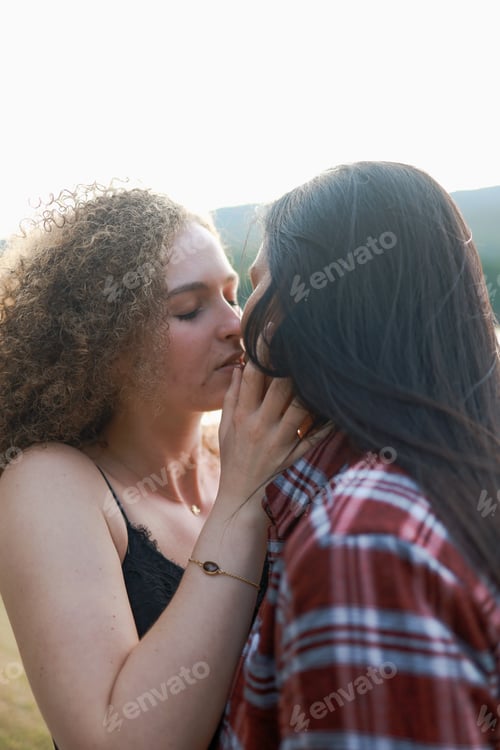 Preview: LGBT Lesbian Couple intimate moments. Young couple multiracial female friends. multi-ethnic female