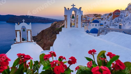 Preview: Sunset at the Greek village of Oia Santorini Greece with a view over the ocean caldera