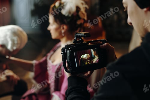 Preview: Caucasian Young Adult Woman Comforting Senior Caucasian Man during Filming