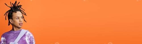 Preview: multiracial man in trendy t-shirt looking away isolated on orange, banner