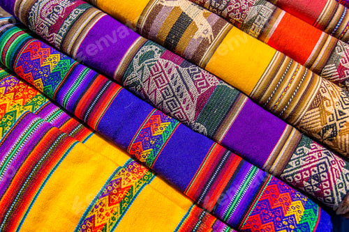 Preview: Rolls of colorful fabrics with abstract patterns in Peru