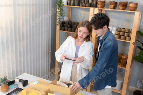 Preview: Young couple runs a small business making clay jewelry.