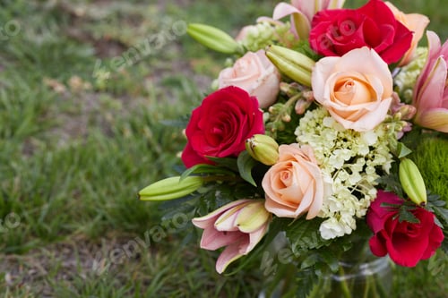 Preview: Bunch of fresh flowers in a vase at the Garden