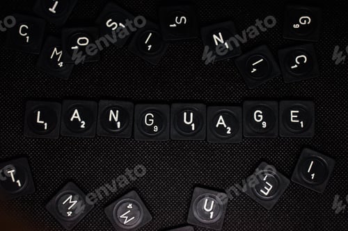 Preview: Top view of the word Language assembled from keyboard keys