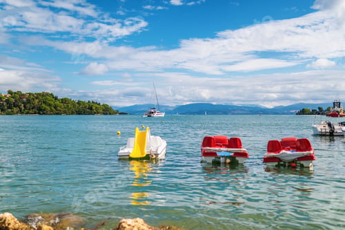 Preview: Catamarans drift near seashore of Corfu island against yacht