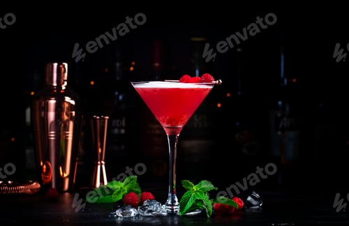 Preview: Summer red cocktail with gin, raspberry syrup, lime juice, quail egg white and ice in glass.
