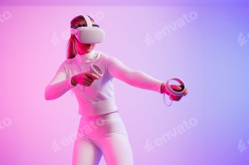 Preview: Athlete in VR glasses practicing martial arts in studio