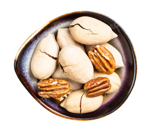 Preview: cracked and shelled pecan nuts in bowl isolated