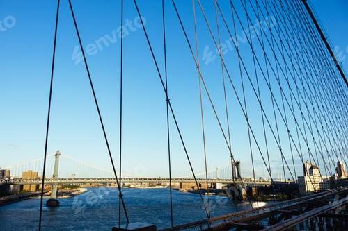 Preview: Brooklyn Bridge in New York against the blue sky