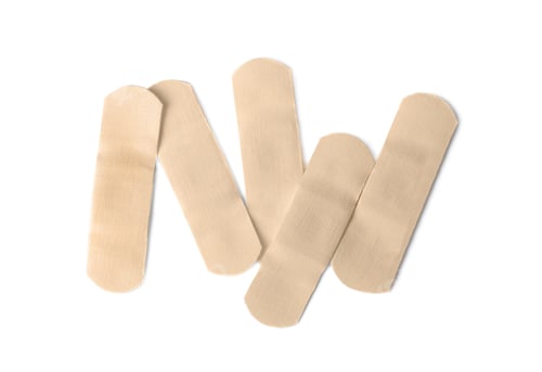 Preview: Medical sticking plasters isolated on white. First aid item