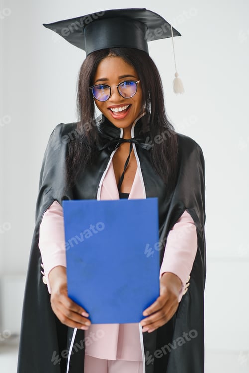 Preview: Young female african american student with diploma.