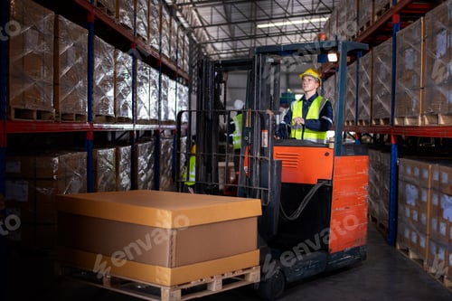 Preview: Worker industry factory drive forklift truck moving goods boxes in warehouse industry production fac