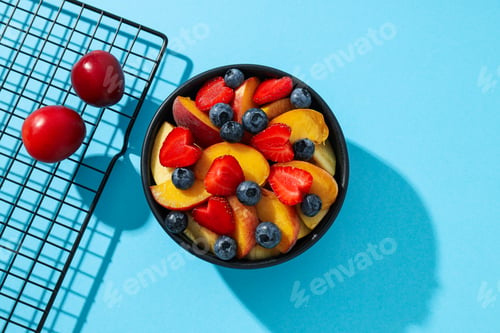 Preview: Healthy food and healthy nutrition concept - fruit salad