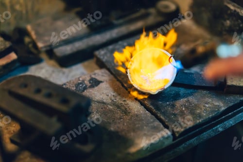 Preview: Jeweler melting gold