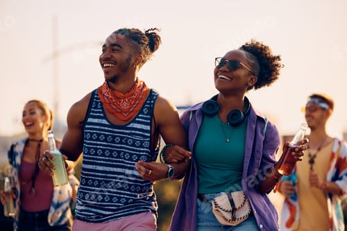Preview: Happy black couple goin on a summer music festival.